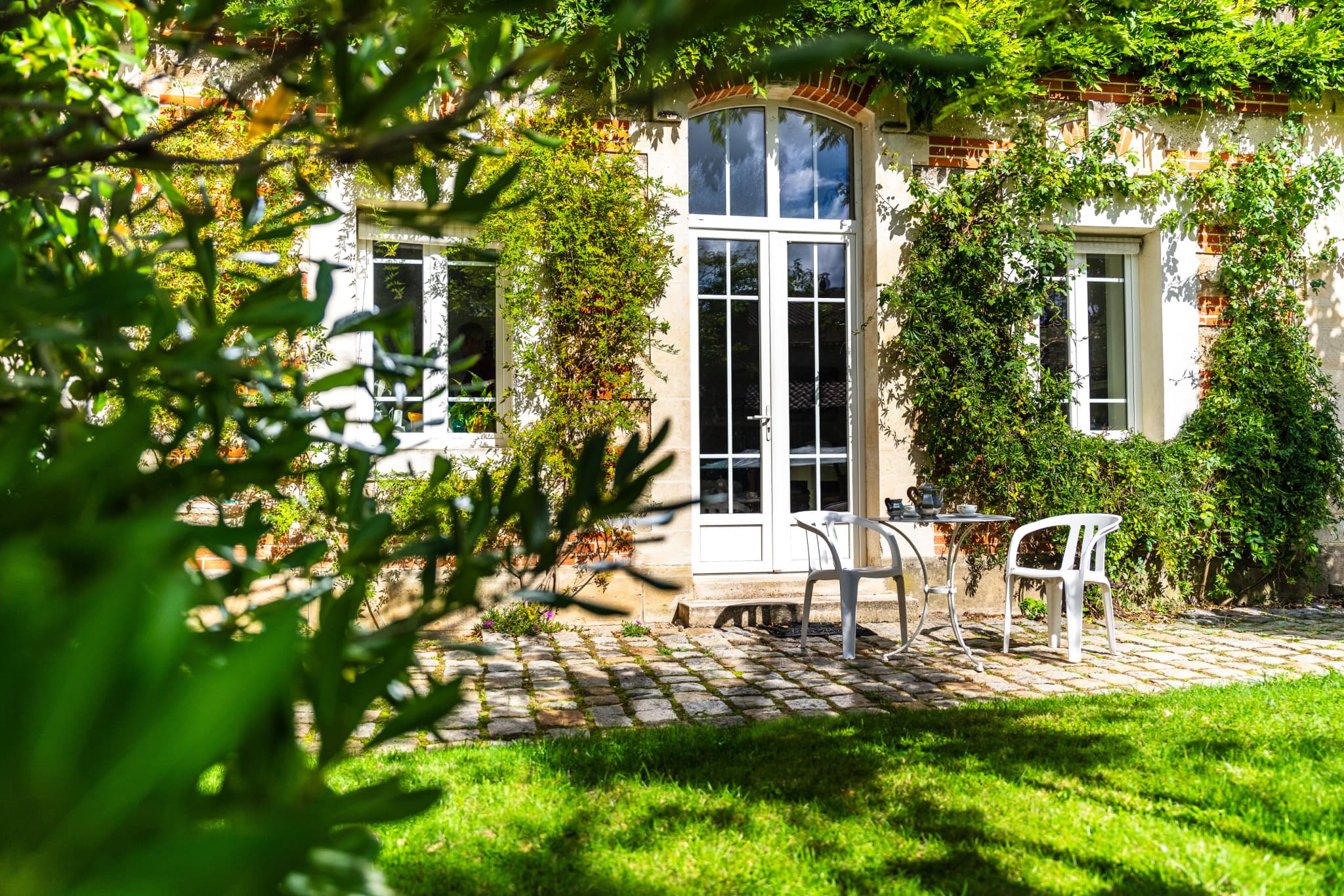 Hôtel particulier de charme en coeur de ville et son grand ja